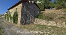 Maison en pierres avec deux logements, terrasse et terrain de 7 800 m² – Saint-Jean-Roure (07160)