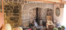 Maison en pierres avec deux logements, terrasse et terrain de 7 800 m² – Saint-Jean-Roure (07160)