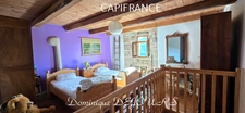 Maison en pierres avec deux logements, terrasse et terrain de 7 800 m² – Saint-Jean-Roure (07160)