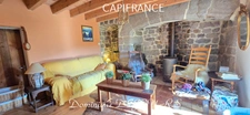 Maison en pierres avec deux logements, terrasse et terrain de 7 800 m² – Saint-Jean-Roure (07160)