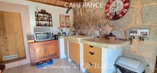 Maison en pierres avec deux logements, terrasse et terrain de 7 800 m² – Saint-Jean-Roure (07160)