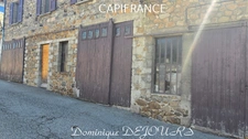 Maison composée de 2 appartements (57 et 43m²) et d'un grand garage de 100m².