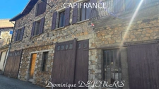 Maison composée de 2 appartements (57 et 43m²) et d'un grand garage de 100m².