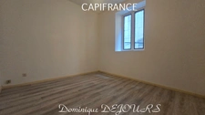 Maison composée de 2 appartements (57 et 43m²) et d'un grand garage de 100m².