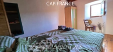 Maison en pierres avec deux logements, terrasse et terrain de 7 800 m² – Saint-Jean-Roure (07160)