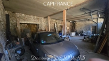 Maison composée de 2 appartements (57 et 43m²) et d'un grand garage de 100m².
