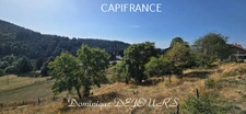 Maison en pierres avec deux logements, terrasse et terrain de 7 800 m² – Saint-Jean-Roure (07160)