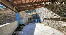 Ardéche, à St Julien du Gua, dans la sauvage et magnifique vallée de l'Auzene, grande maison de 178m² avec très grands sous-sols avec garage et atelier