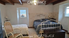 Proche d'Albon d'Ardèche dans la vallée de la Glueyre, maison de 95m² avec un garage, terrasse et terrain