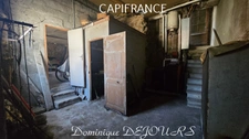 Maison composée de 2 appartements (57 et 43m²) et d'un grand garage de 100m².