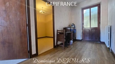 Maison composée de 2 appartements (57 et 43m²) et d'un grand garage de 100m².