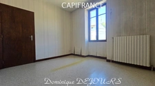 Maison composée de 2 appartements (57 et 43m²) et d'un grand garage de 100m².