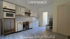 Maison composée de 2 appartements (57 et 43m²) et d'un grand garage de 100m².