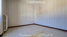 Maison composée de 2 appartements (57 et 43m²) et d'un grand garage de 100m².