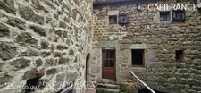 Ardèche, 5 minutes by car from St Pierreville in the heart of the Monts d'Ardèche national park, spacious house of 178m² with a large outbuilding of 200m² on 2 levels to be converted