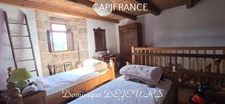 Maison en pierres avec deux logements, terrasse et terrain de 7 800 m² – Saint-Jean-Roure (07160)