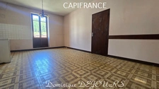 Maison composée de 2 appartements (57 et 43m²) et d'un grand garage de 100m².