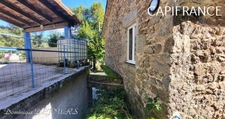 Ardéche, à St Julien du Gua, dans la sauvage et magnifique vallée de l'Auzene, grande maison de 178m² avec très grands sous-sols avec garage et atelier