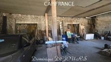 Maison composée de 2 appartements (57 et 43m²) et d'un grand garage de 100m².