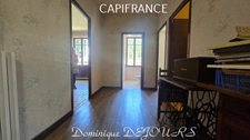 Maison composée de 2 appartements (57 et 43m²) et d'un grand garage de 100m².