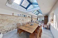 Dpt Côtes-d’Armor (22), à vendre GUINGAMP 22200 - Maison contemporaine T6 161,56 m² - Vie de plain-pied - Véranda 45 m² - Pergola bioclimatique - 2 garages - Terrain 609 m²
