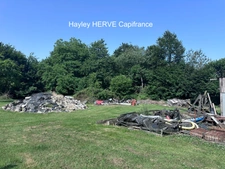 Ensemble de bâtiments avec terrain clos de 3 600 m² – Idéal artisan CHAULIEU (50)