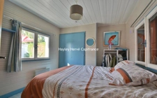À vendre, à deux pas de la plage : chalet avec terrain, garages et beau potentiel Asnelles (14) (Calvados)