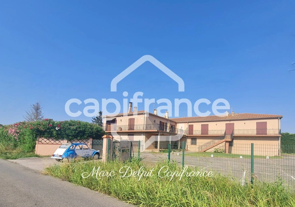 Immeuble plus terrain agricole