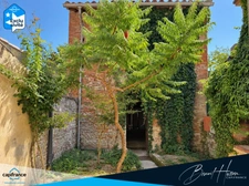 Maison de ville de 130m² avec cour, garage et dépendance 