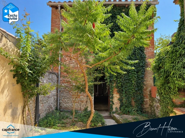 Maison de ville de 130m² avec cour, garage et dépendance 