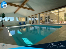 Maison T4 de 168m² de plain-pied avec piscine intérieure et sous-sol
