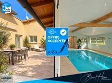 Maison T4 de 168m² de plain-pied avec piscine intérieure et sous-sol