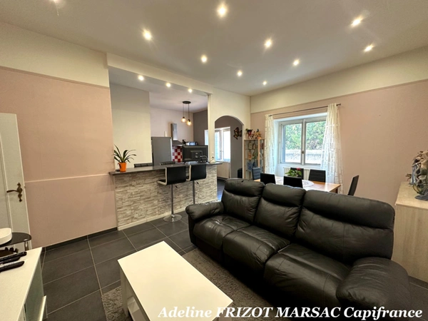 APPARTEMENT 2 CHAMBRES - SEJOUR 34M2 - GARAGE DOUBLE - CAVE 