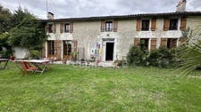 For sale, Authentic Charentaise farmhouse of 186 m² living space with large wooded grounds in Berneuil 