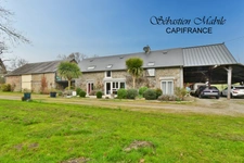 Belle propriété à vendre à SAINT AUBIN DE TERREGATTE (Maison, plusieurs dépendances, gîte) sur 2 hectares 