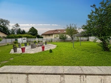 5-bedroom family home in Ségny with spacious rooms and a magnificent garden 
