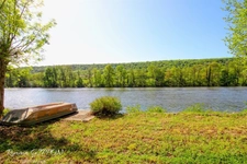 Architect-designed house, 7 rooms, 220m2 - view of and access to the Moselle river via private pontoon - LIVERDUN (54)