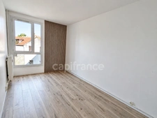 Appartement F3 avec loggia et parking - proche commerces et gare