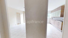 3 pièces 58 m² avec balcon et cave, proche gare.