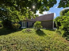 Maison familiale de caractère – 220 m² habitables – 6 chambres – jardin de 880 m² – terrasse plein sud – double garage