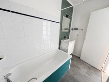 Appartement F3 avec loggia et parking - proche commerces et gare