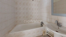3 pièces 58 m² à rénover, proche gare et centre-ville