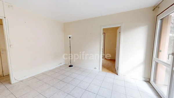 3 pièces 58 m² avec balcon et cave, proche gare.