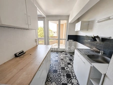 Appartement F3 avec loggia et parking - proche commerces et gare