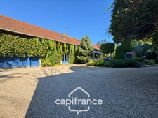 A property full of character in the heart of a verdant setting in Saint-Marcel