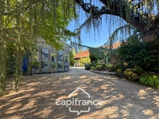 A property full of character in the heart of a verdant setting in Saint-Marcel