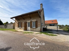 Maison en pierre de 1865 – 3 chambres, garage et jardin : une belle opportunité à Bey