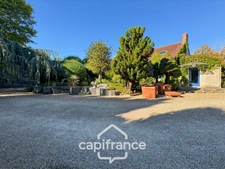A property full of character in the heart of a verdant setting in Saint-Marcel