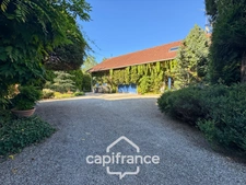 A property full of character in the heart of a verdant setting in Saint-Marcel