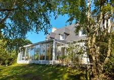 Maison à vendre sur sous-sol total - secteur Plogonnec - Surface habitable 134 m2 - 6 pièces- 4 chambres - 1 bureau- véranda- jardin-parcelle de 2794 m2 